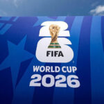 Television screen displaying a live broadcast of a FIFA World Cup 2026 football match